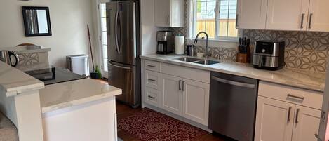 Forn, placa de cuina i rentaplats