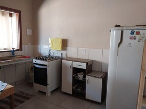 Fridge, stovetop, electric kettle, blender