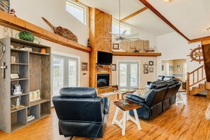 TV, fireplace, books