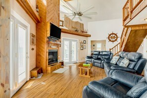TV, fireplace, books