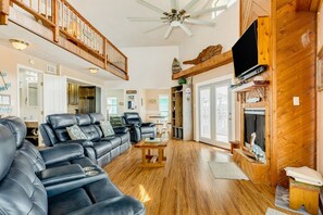 TV, fireplace, books