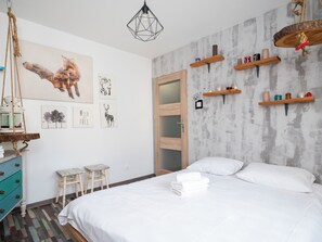 1 habitación, tabla de planchar con plancha, wifi y ropa de cama 