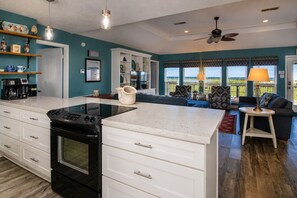 Coffee/tea maker, fridge, microwave, oven