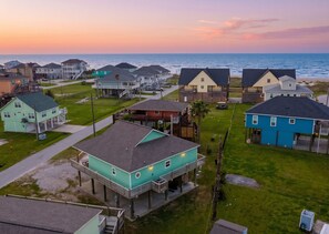 A coastal residential area with houses featuring balconies and a view of the ocean. - Stunning | Gulf Views | Firepit (Crystal Beach)