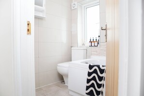 Hair dryer, towels, soap, toilet paper