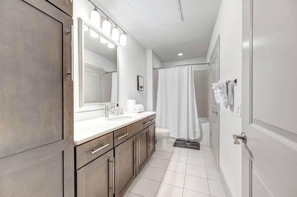 Hair dryer, towels, soap, toilet paper