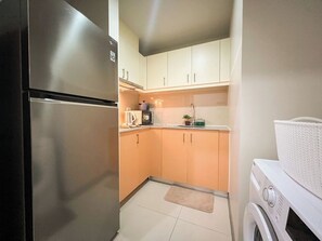 Fridge, microwave, stovetop, cookware/dishes/utensils