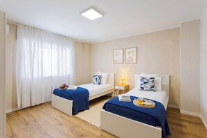 2 slaapkamers, een strijkplank/strijkijzer, reisbedje, gratis wifi