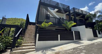 Sea View Condo, Minutes from UVF Int’l Airport - Spacious & Modern Stay