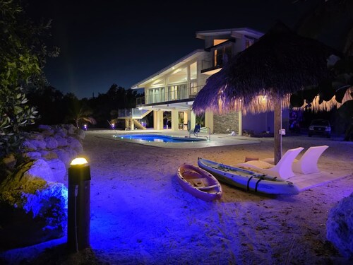 Four-bedroom beach house  with oceanfront pool and smokeless bonfire area