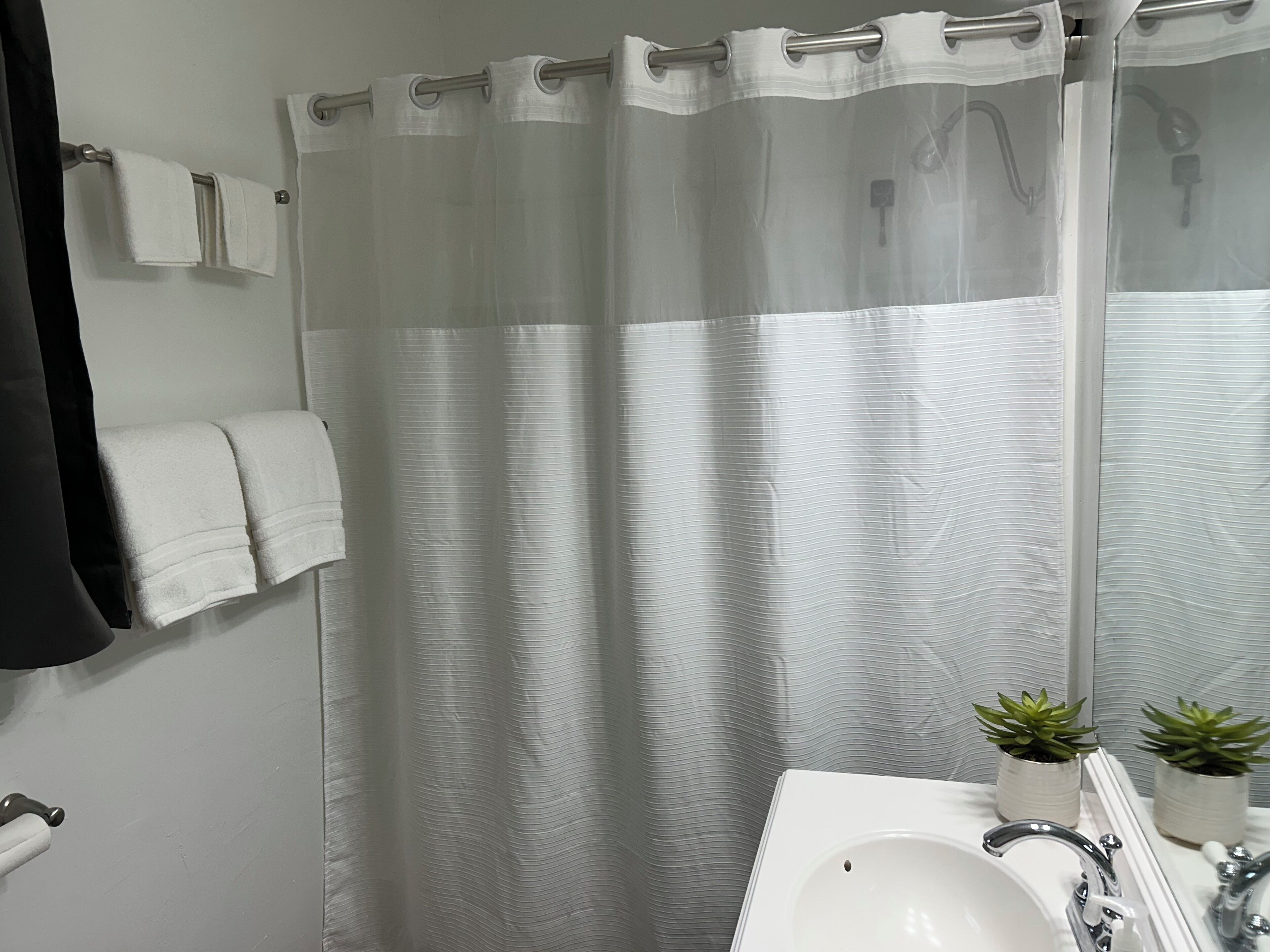 Hair dryer, towels, soap, shampoo