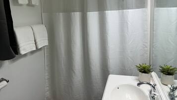 Hair dryer, towels, soap, shampoo
