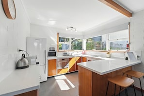 Casa conforto, vista para o mar | Cozinha privada