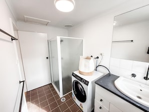 Hair dryer, towels, soap, shampoo