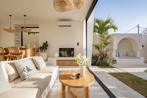 Luxury Villa, 1 Bedroom, Pool View | Living room | 43-inch TV with cable channels