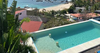 Beautiful Villa with private pool balconies amazing view and steps to the beach