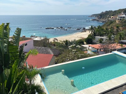 Beautiful Villa with private pool balconies amazing view and steps to the beach