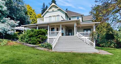 Beautiful home with foosball table, waterfront views, fireplace, basketball cour