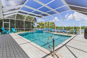 A heated pool - Exquisite waterfront home with private pool, hot tub, amd dock (Cape Coral)