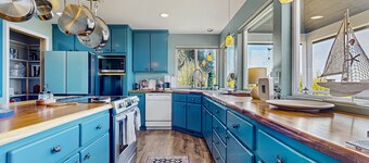 Luxurious water view home surrounded by wildlife and a private hot tub