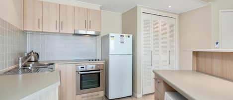 Microwave, stovetop, dishwasher, dining tables