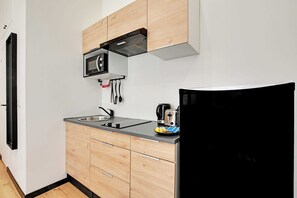 Apartment | Private kitchen | Fridge, microwave, stovetop, dishwasher
