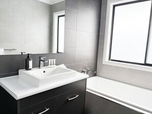 Hair dryer, soap, shampoo, toilet paper