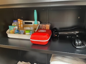 Shower, hair dryer, towels, soap