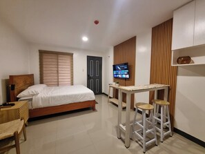 Desk, blackout drapes, iron/ironing board, free WiFi