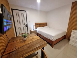 Desk, blackout drapes, iron/ironing board, free WiFi
