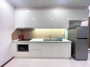 Apartamento superluxo, sacada, vista para o pátio | Cozinha privada