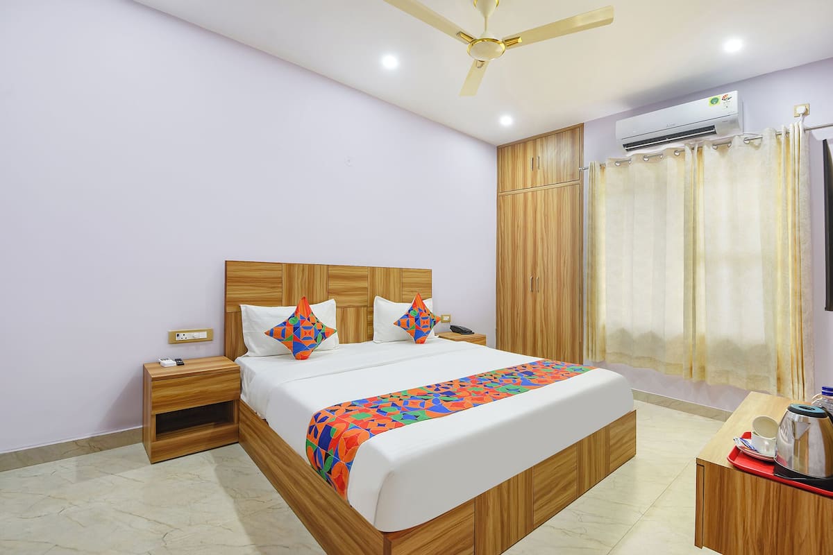 Habitación Deluxe | Sábanas de algodón egipcio, ropa de cama de alta calidad, caja fuerte