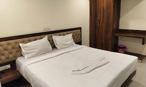 Habitación Deluxe | Sábanas de algodón egipcio, ropa de cama de alta calidad, caja fuerte