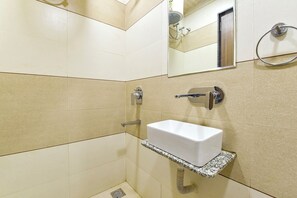 Deluxe Room | Bathroom | Shower, rainfall showerhead, free toiletries, towels - Fabexpress Fusion Stays (Indore)