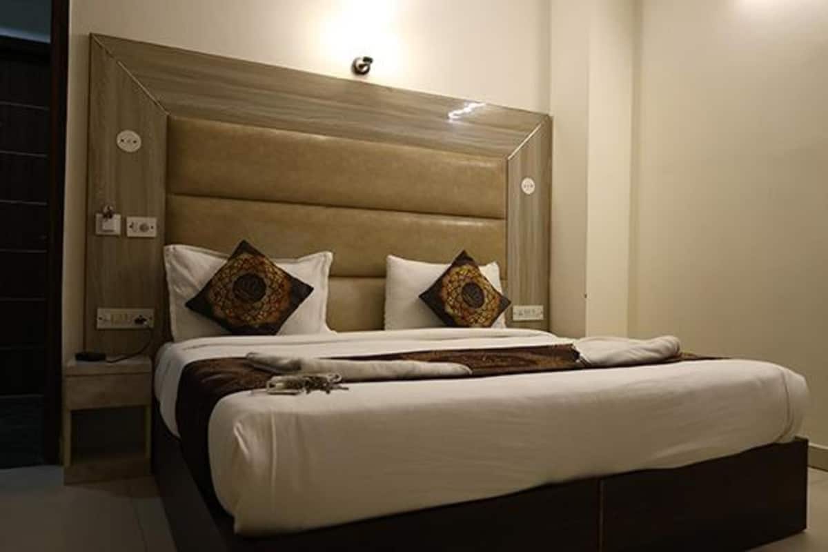 Deluxe kamer | Lakens van Egyptisch katoen, luxe beddengoed, een kluis op de kamer