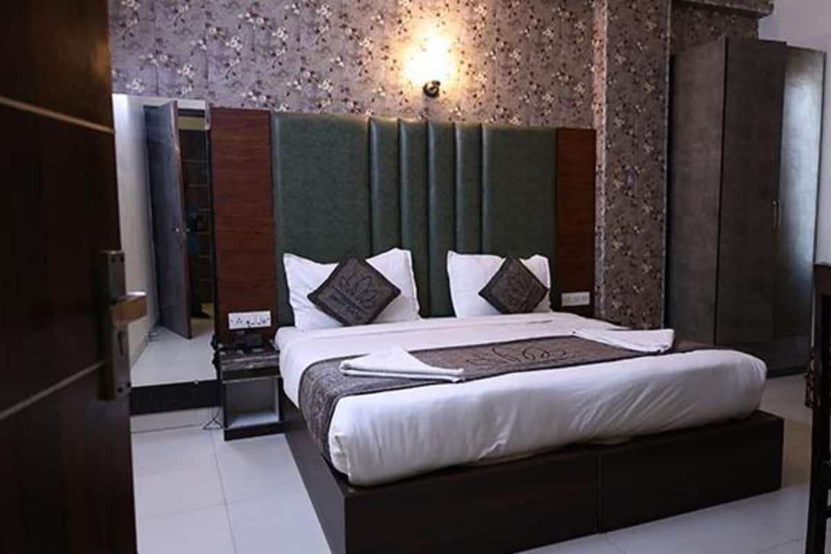 Premium kamer | Lakens van Egyptisch katoen, luxe beddengoed, een kluis op de kamer