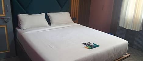 Habitació Deluxe | Llençols de cotó egipci i roba de llit d'alta qualitat