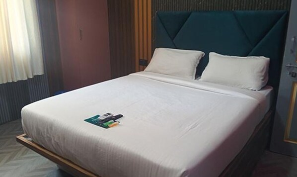 Habitación Deluxe | Sábanas de algodón egipcio y ropa de cama de alta calidad 