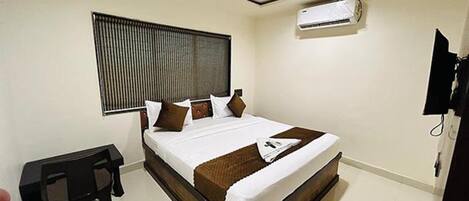 Lakens van Egyptisch katoen, luxe beddengoed, een kluis op de kamer