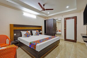 Deluxe Room | Egyptian cotton sheets, premium bedding, in-room safe, free WiFi - Fabhotel Surya International (Nellore)