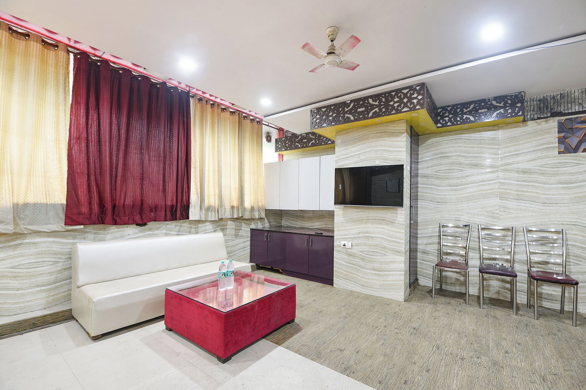 Premium Room | Living area | 28-inch LCD TV with cable channels