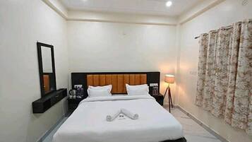 Habitación Deluxe | Sábanas de algodón egipcio y ropa de cama de alta calidad