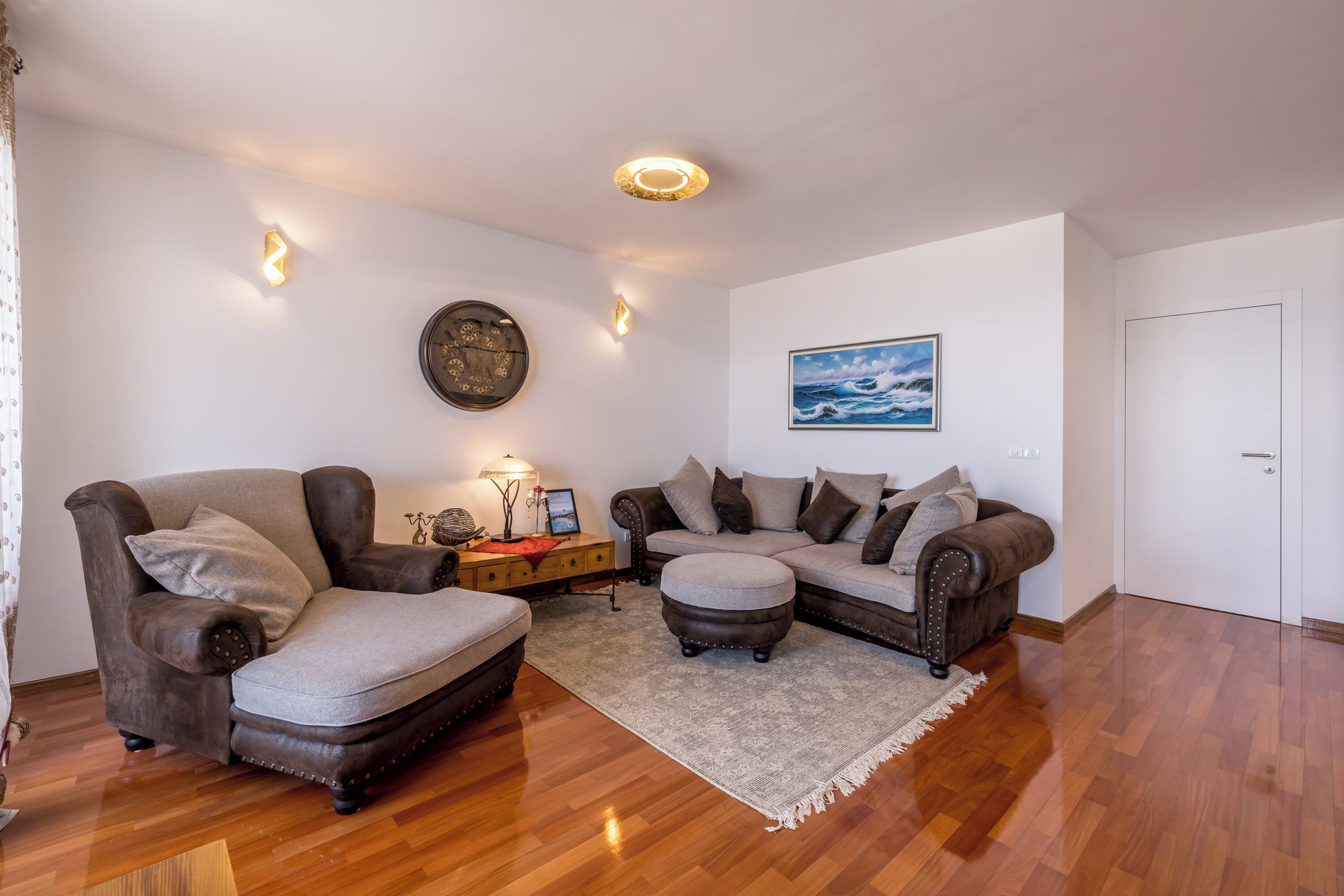 Luxury Apartment | Living area | 36-inch flat-screen TV with cable channels