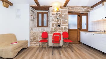 Studio | Living area | 26-inch flat-screen TV with cable channels