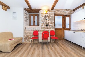 Studio | Living area | 26-inch flat-screen TV with cable channels