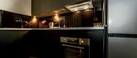 Appartement | Privékeuken | Een koelkast, een kookplaat, een vaatwasser