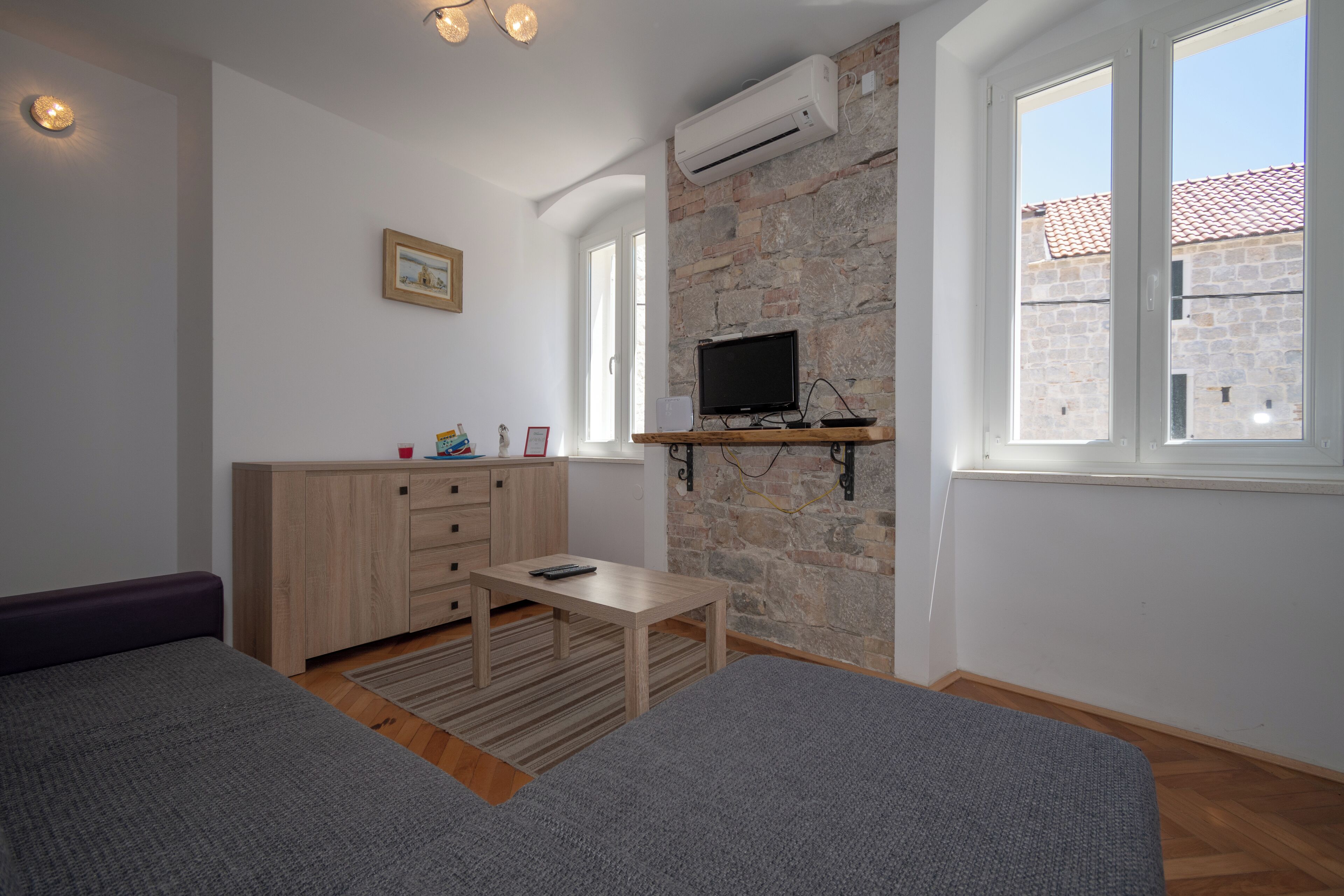 Apartamento | Área de estar | TV de tela plana 26 polegadas com canais a cabo