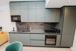 Apartment | Private kitchen | Fridge, microwave, oven, stovetop