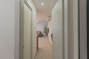 Luxury Apartment | Living area | 56-cm flat-screen TV with cable channels