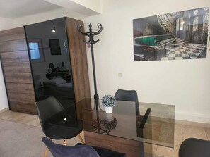 Studio | Living area | 26-inch flat-screen TV with cable channels - Db Interiors (Split)